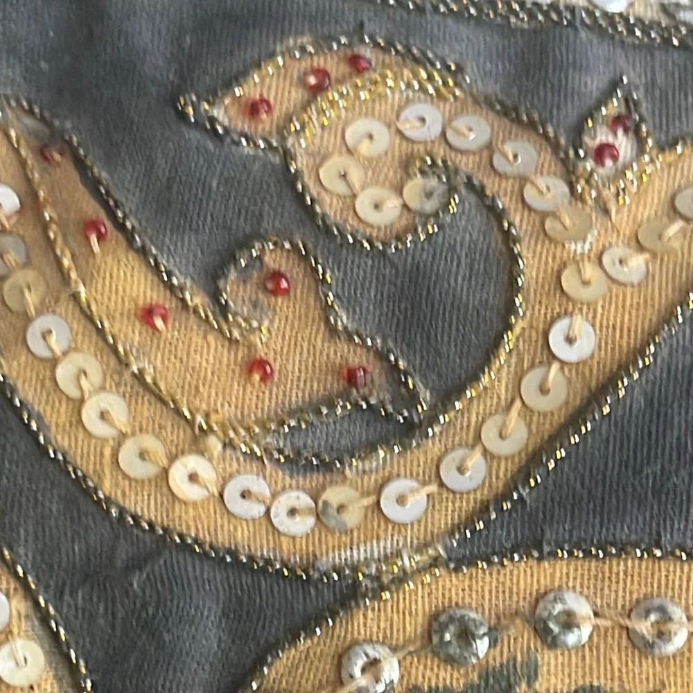 Elephant lovers this pillow is lovely exotic and quite intricate black silk back